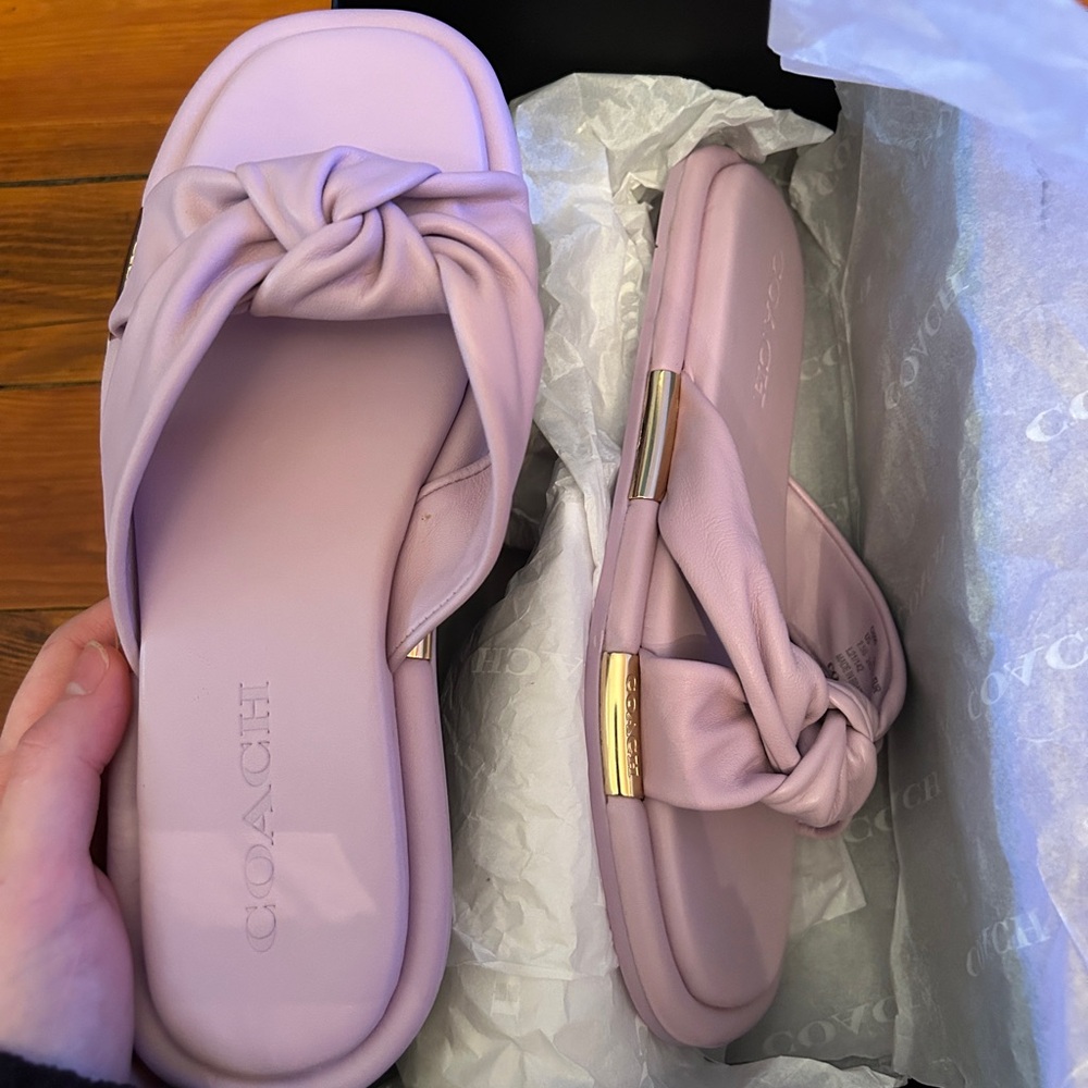 Brand new lavender Coach sandals, size 7.5, never worn.